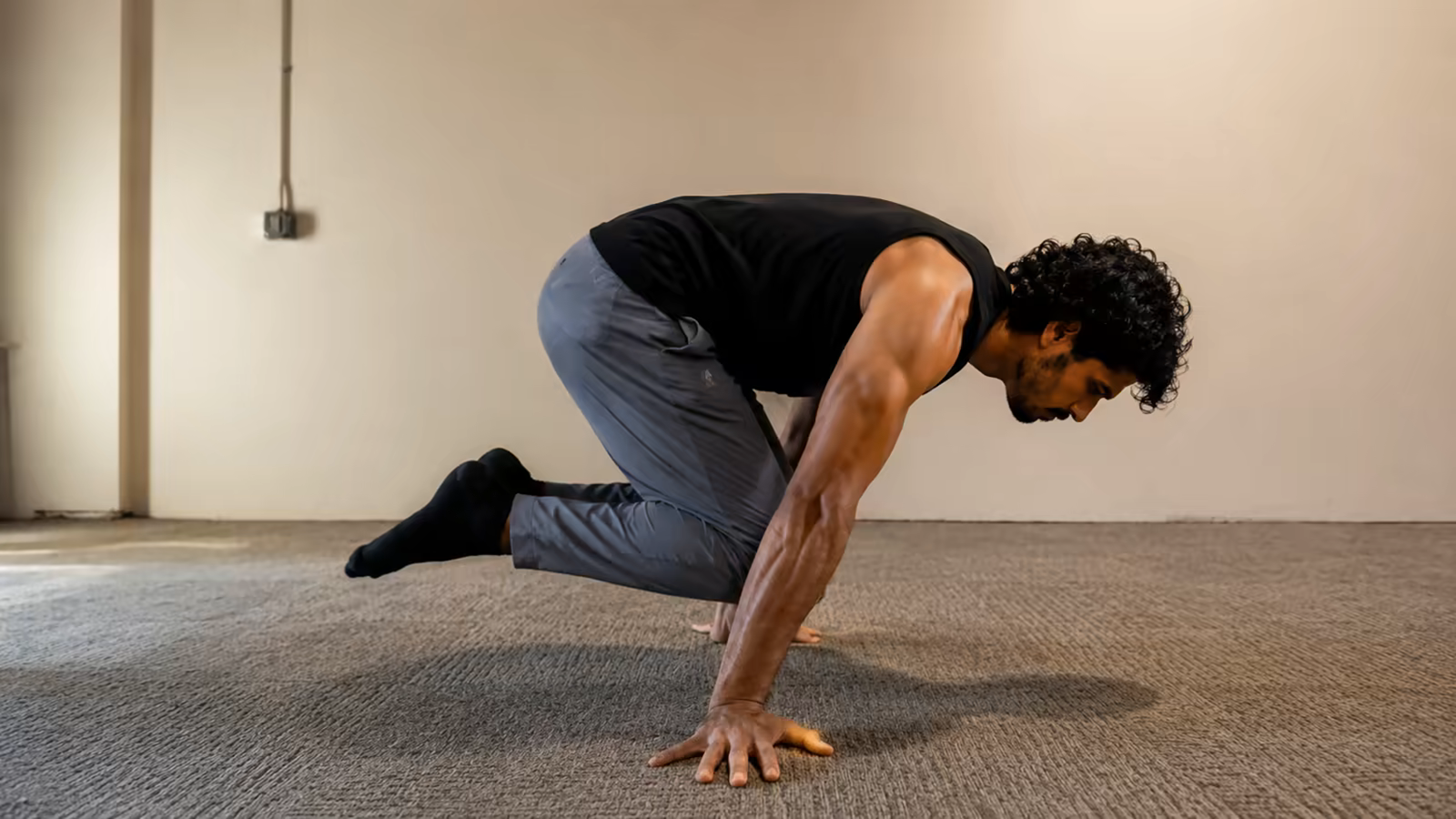 The tuck planche demands full-body integration. Nothing can be passive.